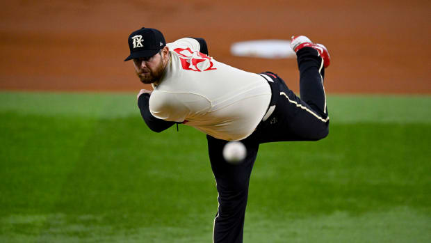 Aug 4, 2023; Arlington, Texas, USA; Texas Rangers starting pitcher Jordan Montgomery (52) pitches against the Miami Marlins during the first inning at Globe Life Field. Mandatory Credit: Jerome Miron-USA TODAY Sports  